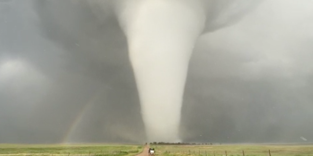 See it: Massive tornado in Nebraska rolls through farmland for an hour as rainbow forms beside it